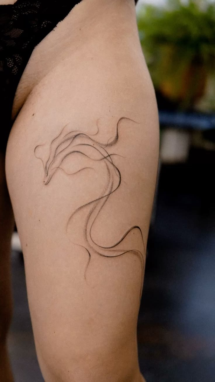 Mẫu hình xăm bắp đùi